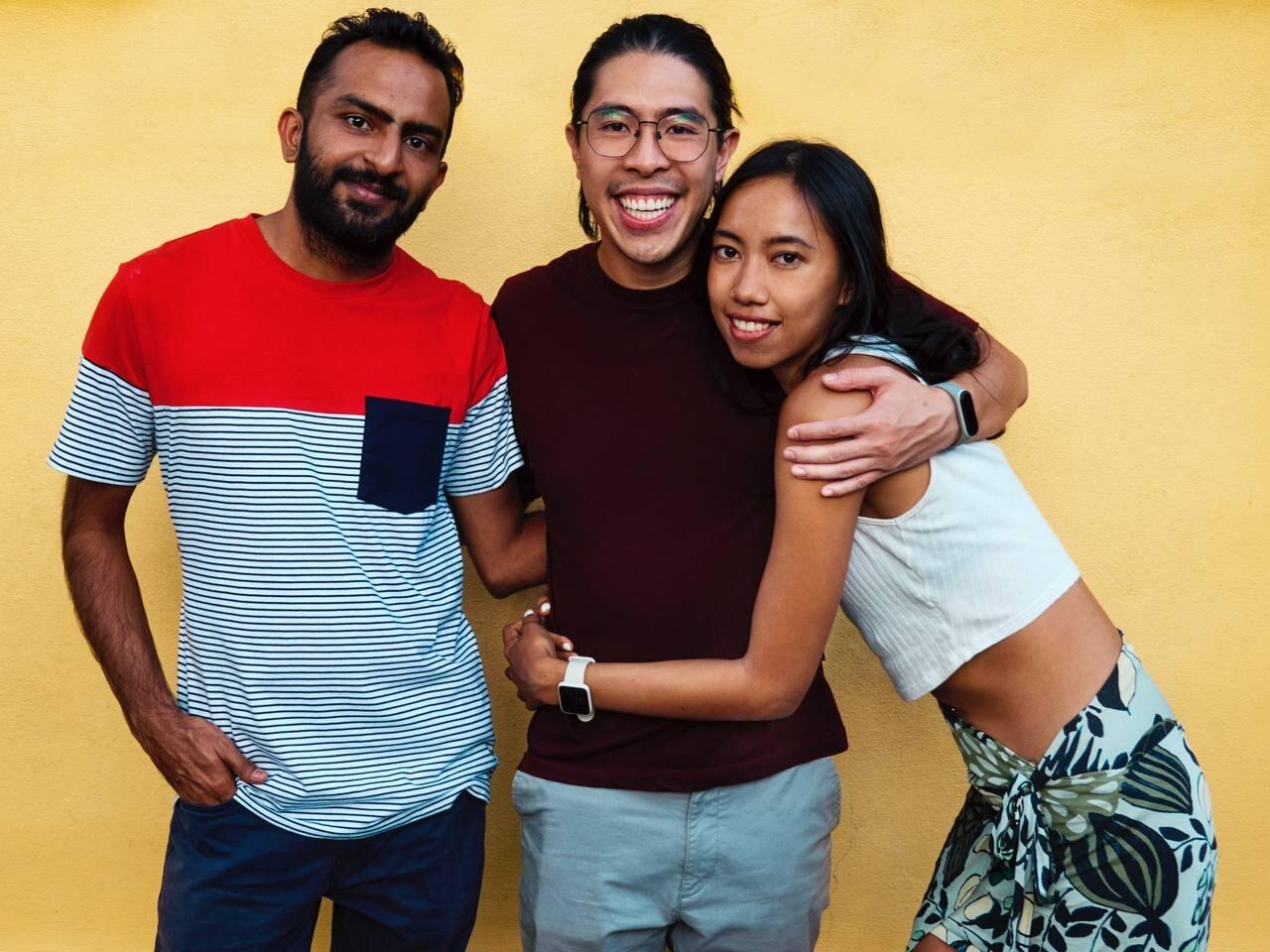 Nivesh with friends, smiling for a photo